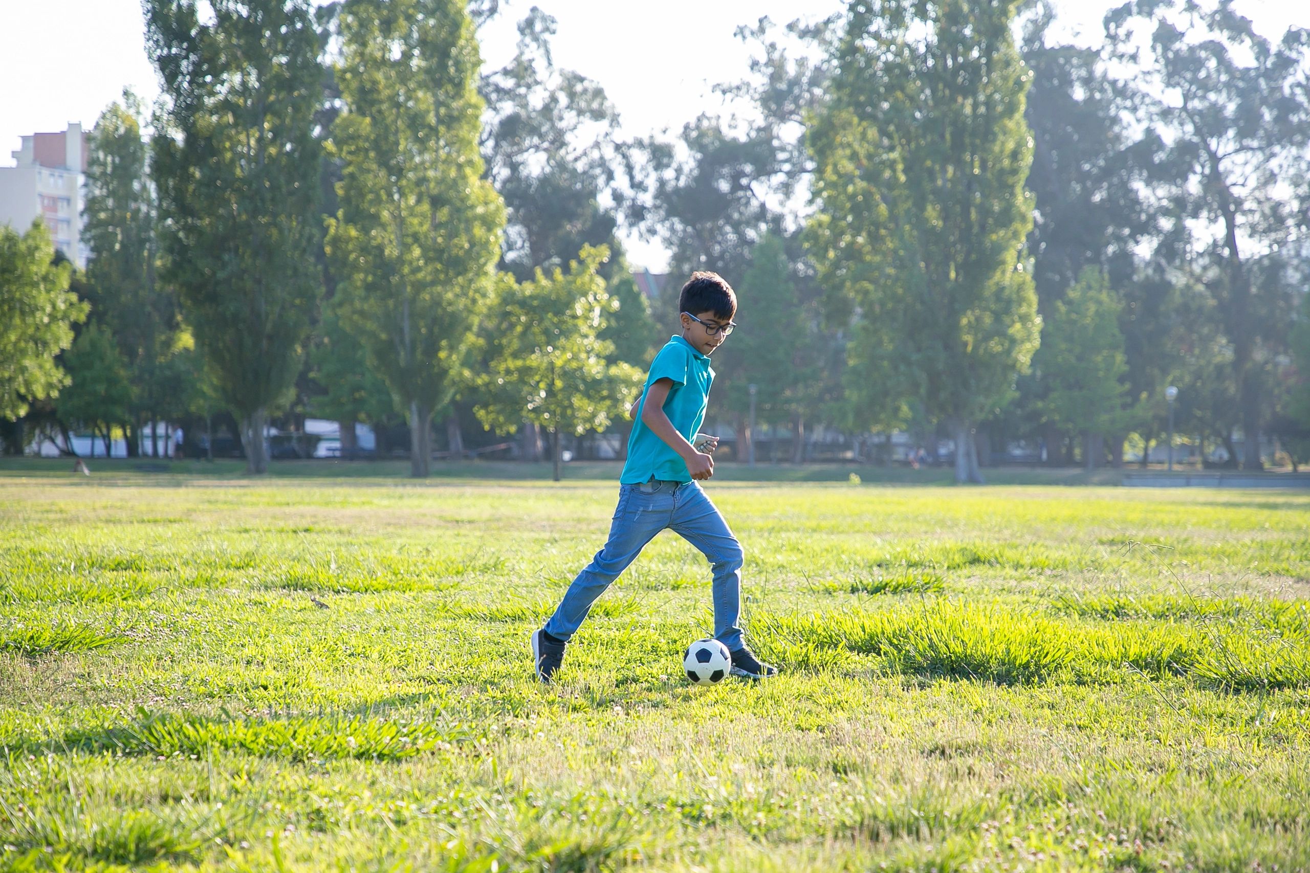 Childhood football photo showing an early love of the game