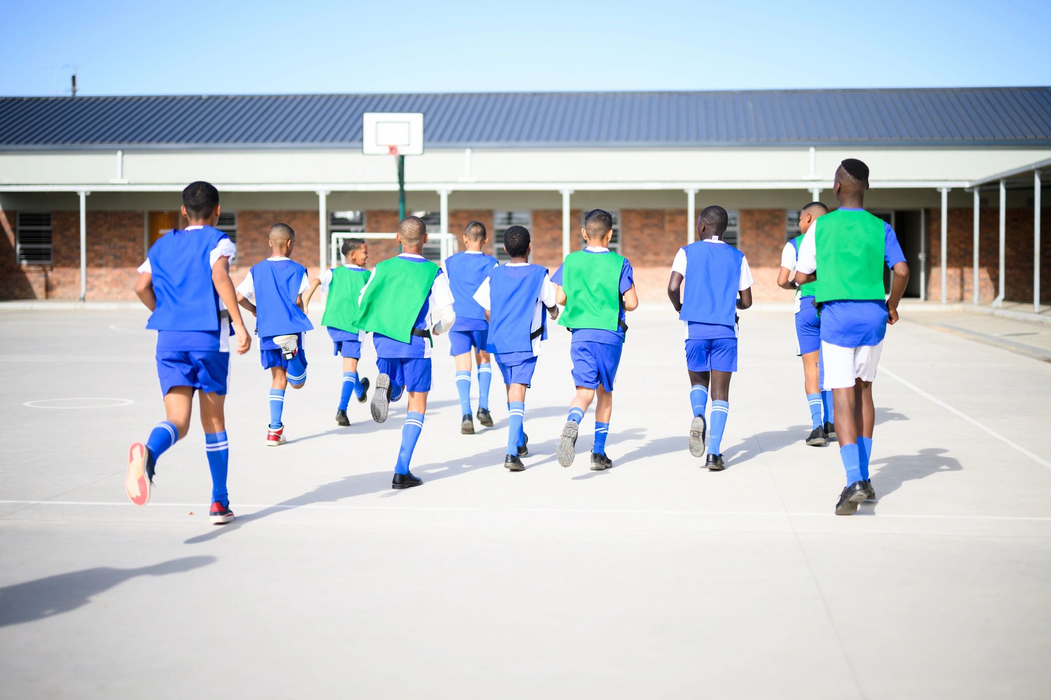 Young players warming up before football training or competition