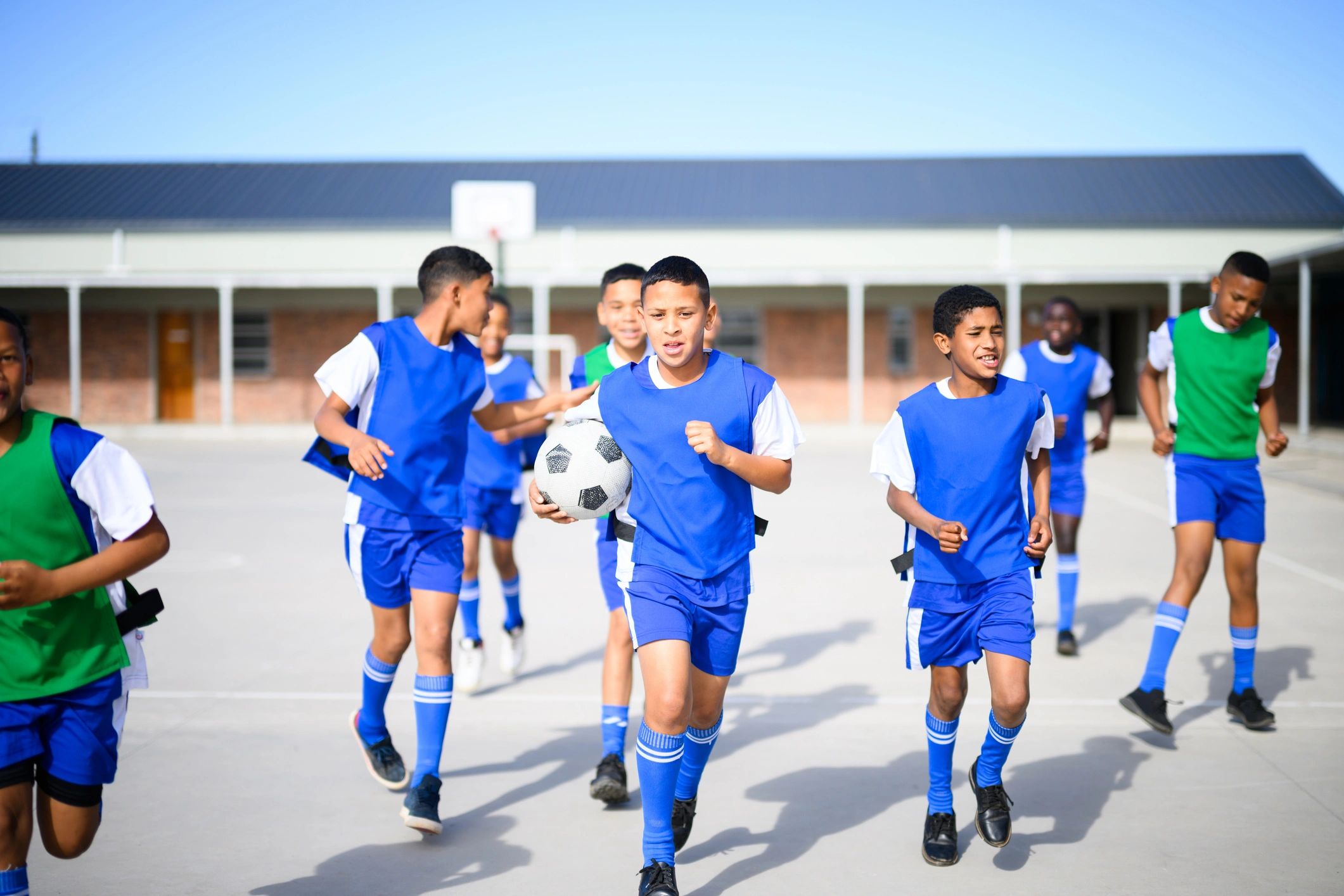 Young players warming up before football training or competition