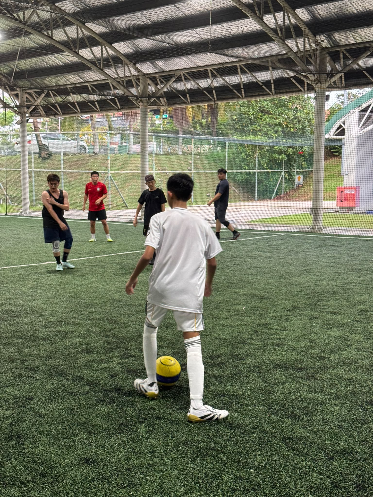 Mac preparing for his first adult game at Kick Off Kovan Singapore