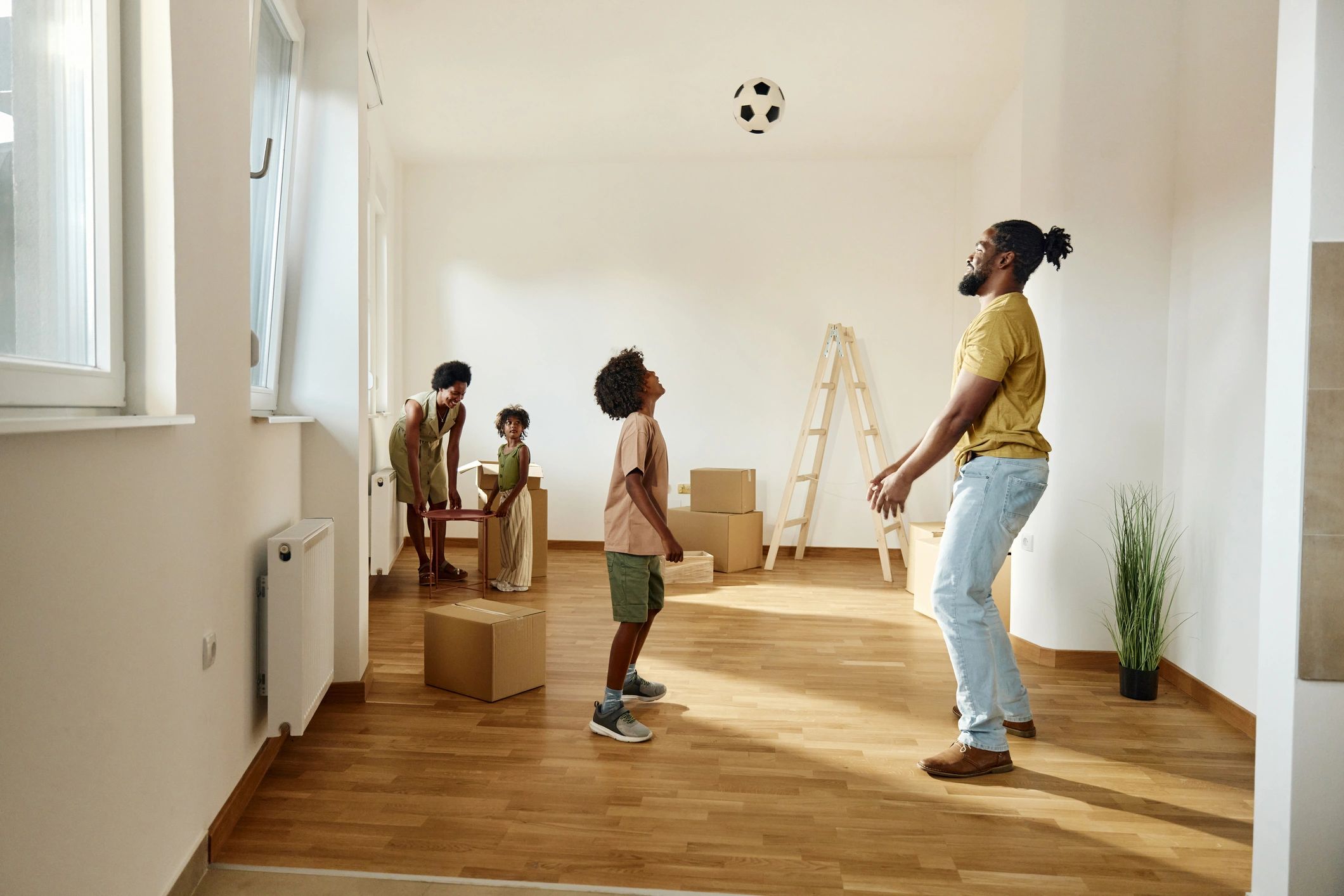 Family enjoying football together at home