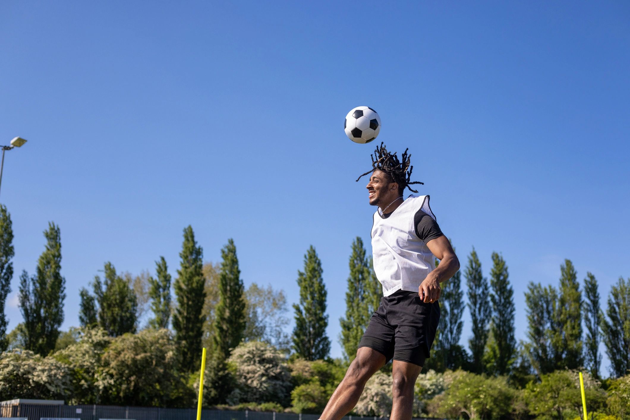 Mid-air heading action during a football session